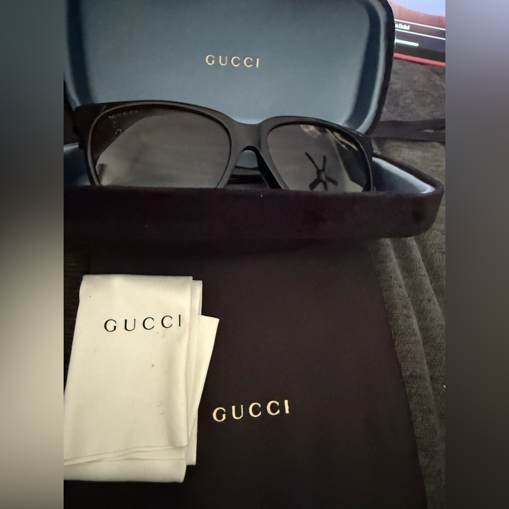 Gucci Black Sunglasses new in case. Still on website